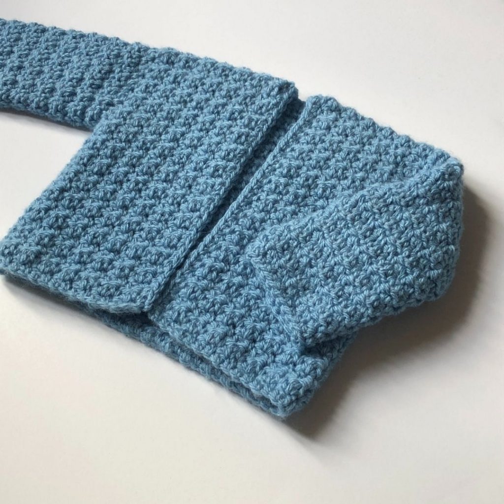 Free crochet baby sweater pattern - Harmony Sweater designed by Kristine from Ambassador Crochet 